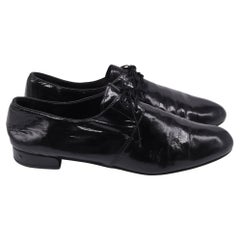 Prada Lace-Up Loafers in Black Patent Leather