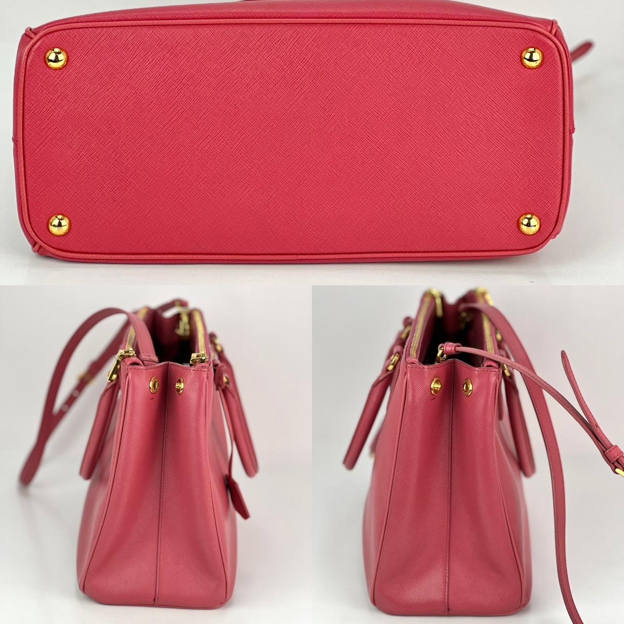 Pre-Owned  100% Authentic
Prada Large Galleria Saffiano Leather Dark Pink Shoulder Bag
RATING: A/B...Very Good, well maintained, 
shows minor signs of wear
MATERIAL: 
STRAP: Prada removable adjustable strap 36'' to 40''
DROP: 17'' to 19''
