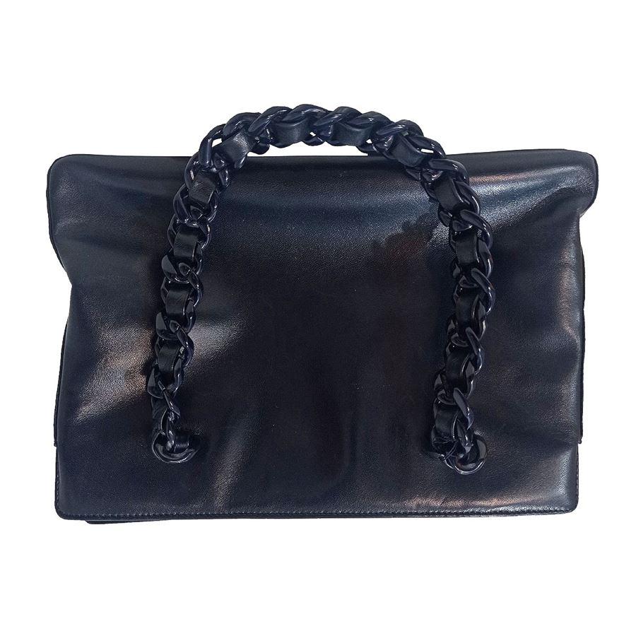 Leather Black color Two handles made of blue colored resin Two internal compartments divides by large zip pocket Internal zip pocket Cm 29 x 19 x 10 (11,4 x 7,4 x 3,93 inches) Signes on leather, fair conditions
