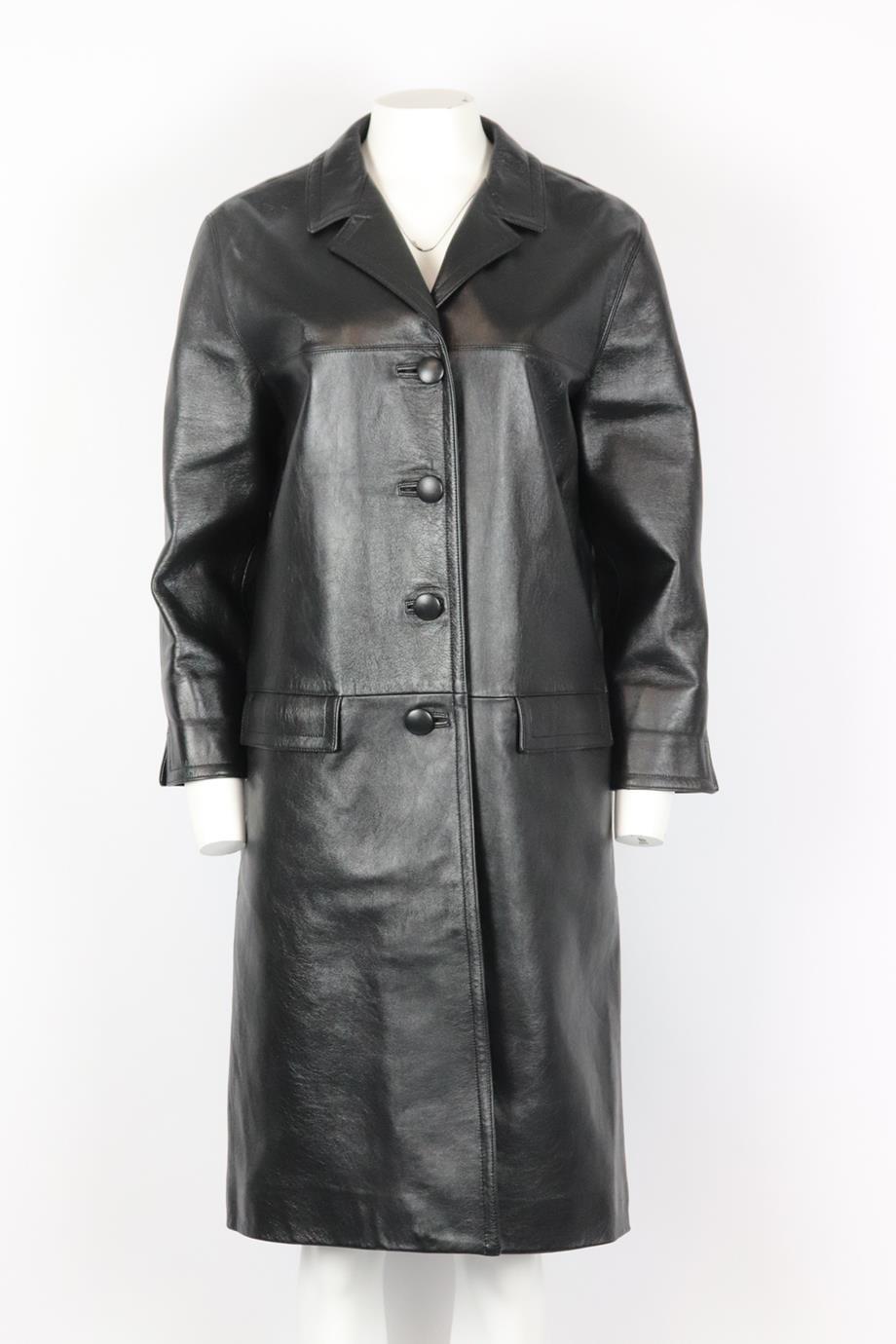 Prada leather coat. Black. Long sleeve, v-neck. Button fastening at front. 100% Lambskin; lining: 100% viscose. Size: IT 44 (UK 12, US 8, FR 40). Shoulder to shoulder: 17 in. Bust: 38 in. Waist: 44 in. Hips: 47 in. Length: 40.5 in. Very good