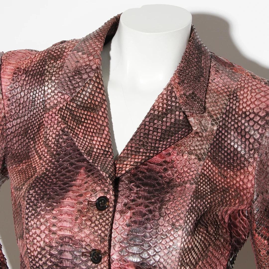 Prada Snakeskin Jacket 
Made in Italy 
Circa early 2000's 
Pink and black 
Single breasted 
Notched collar 
Five buttons down front of jacket 
Two pockets on front of jacket 
Excellent condition; Preloved with no visible signs of wear or use