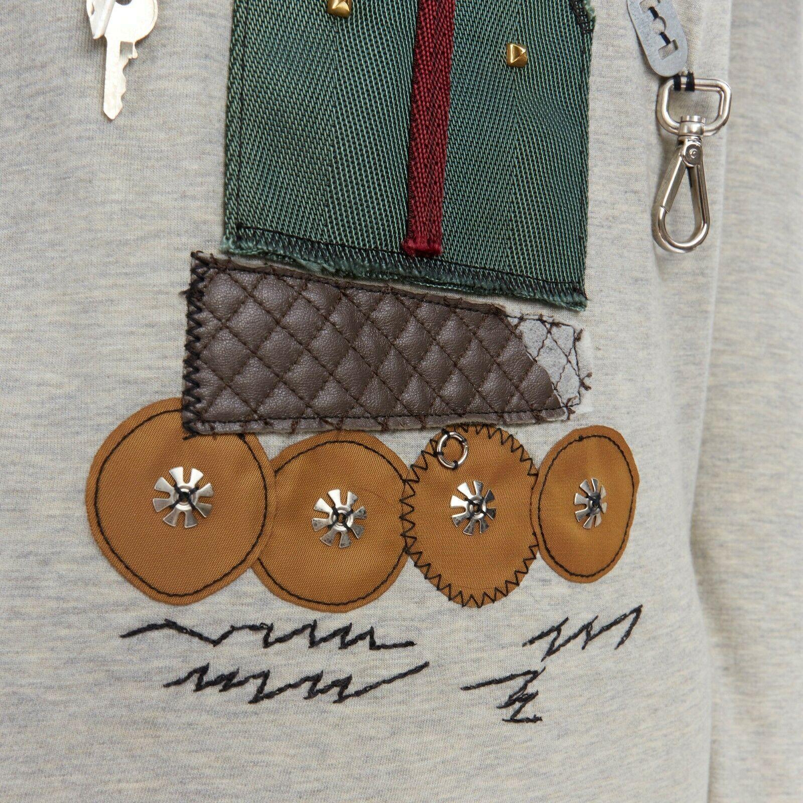PRADA top a maniche lunghe grigio sfumato impreziosito da hardware robotico XS 5