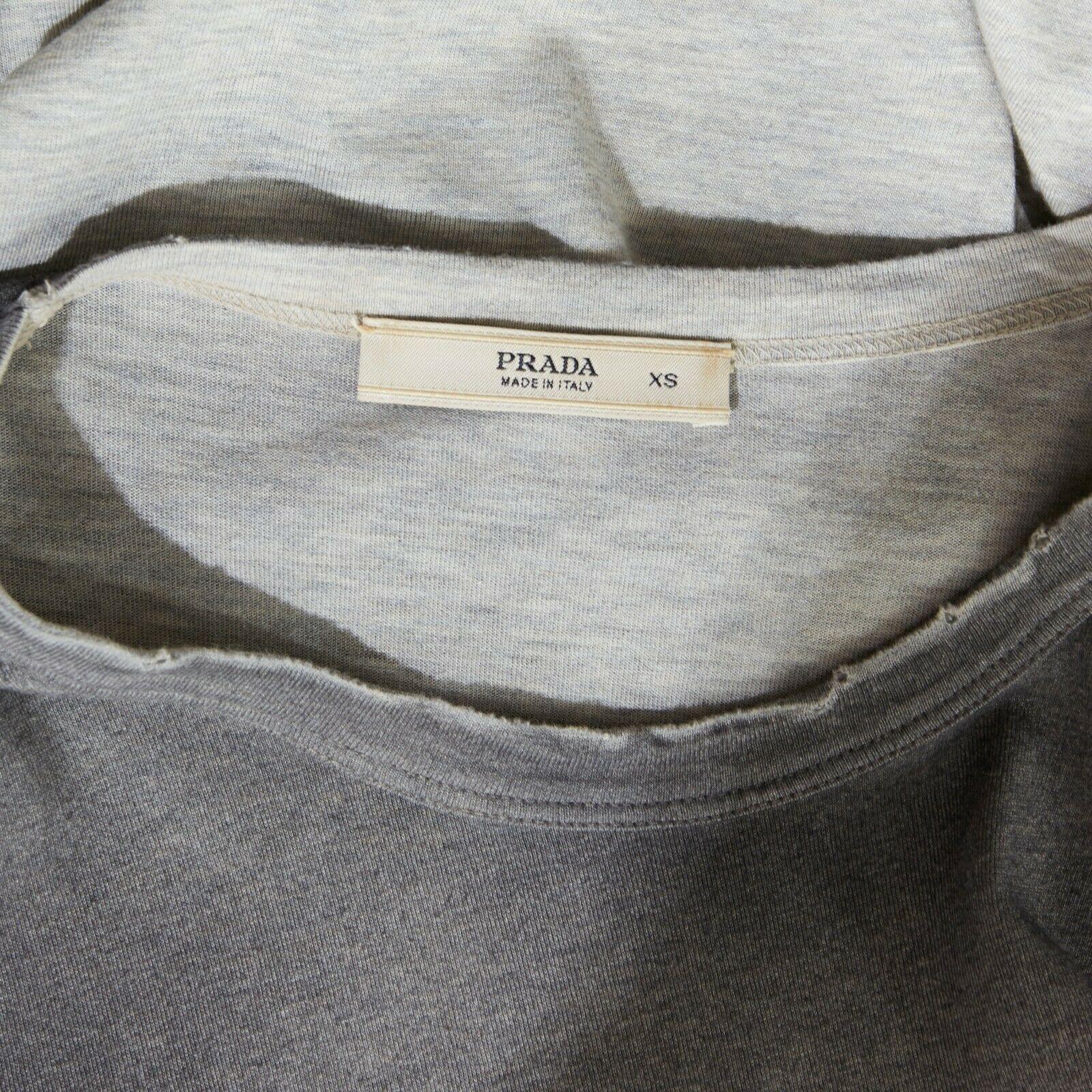 PRADA top a maniche lunghe grigio sfumato impreziosito da hardware robotico XS 7