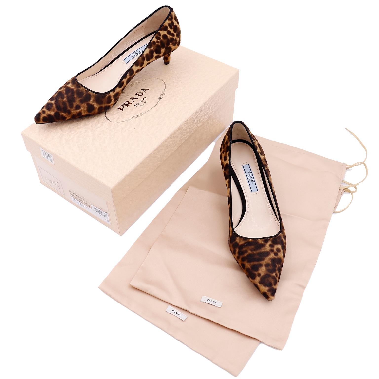 These are fun Prada leopard print pony fur kitten heels with black trim around foot opening and a pointed toe. These shoes appear to be unworn and come with their original box and shoe bags.
Labeled Prada Milano Made in Italy DAL 1913

Marked a size