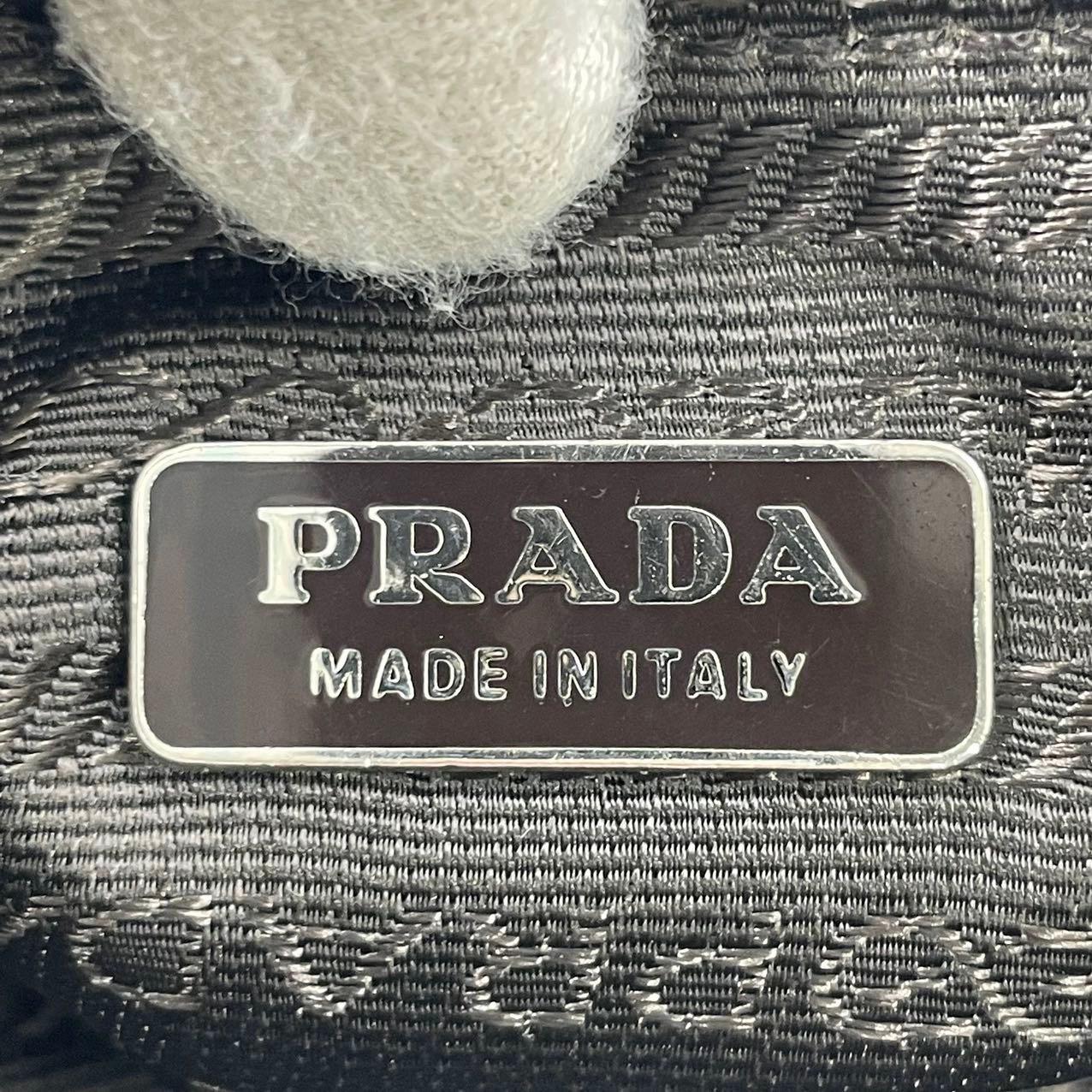 Prada Leopard Print Pony-style Calfskin Mini Clutch in vendita 1