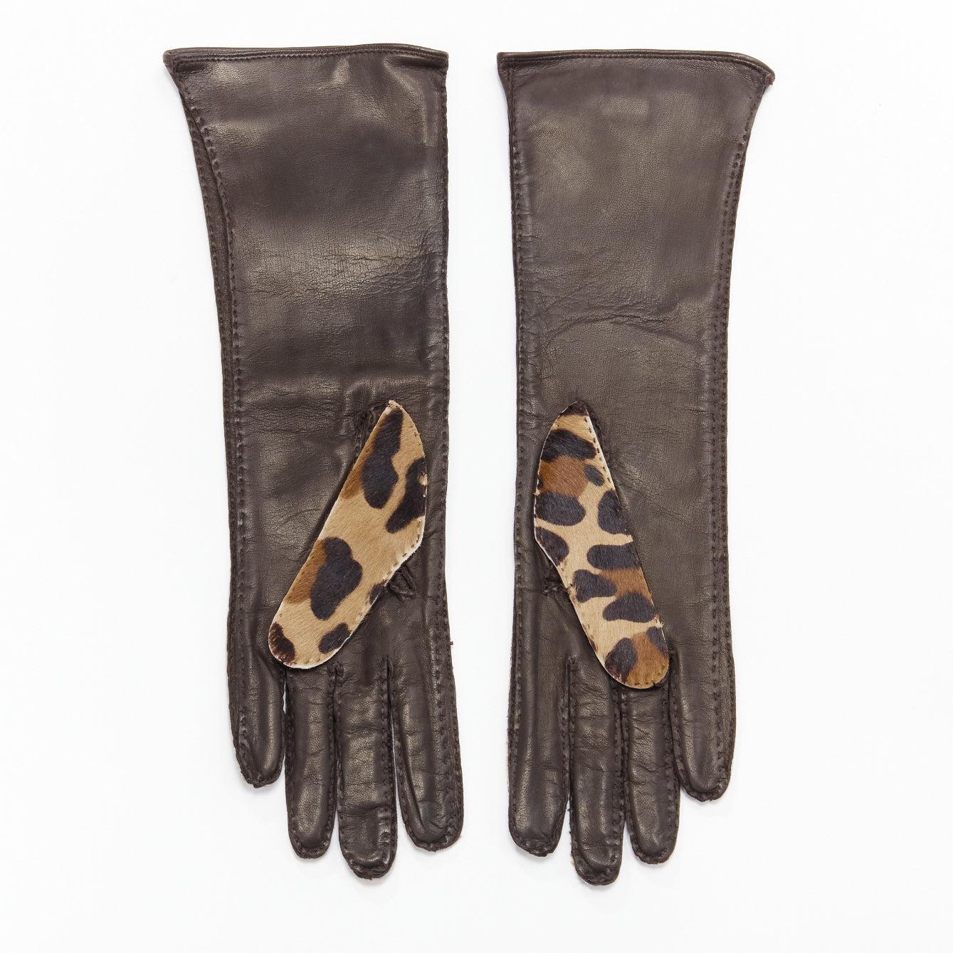 PRADA leopard print ponyhair leather mid length gloves Sz6.5
Reference: BSHW/A00127
Brand: Prada
Designer: Miuccia Prada
Material: Leather, Pony Hair
Color: Brown, Beige
Pattern: Leopard
Closure: Slip On
Lining: Brown
Made in: