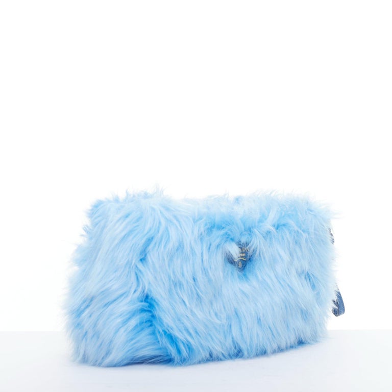 PRADA light blue faux fur triangle logo wristlet clutch bag