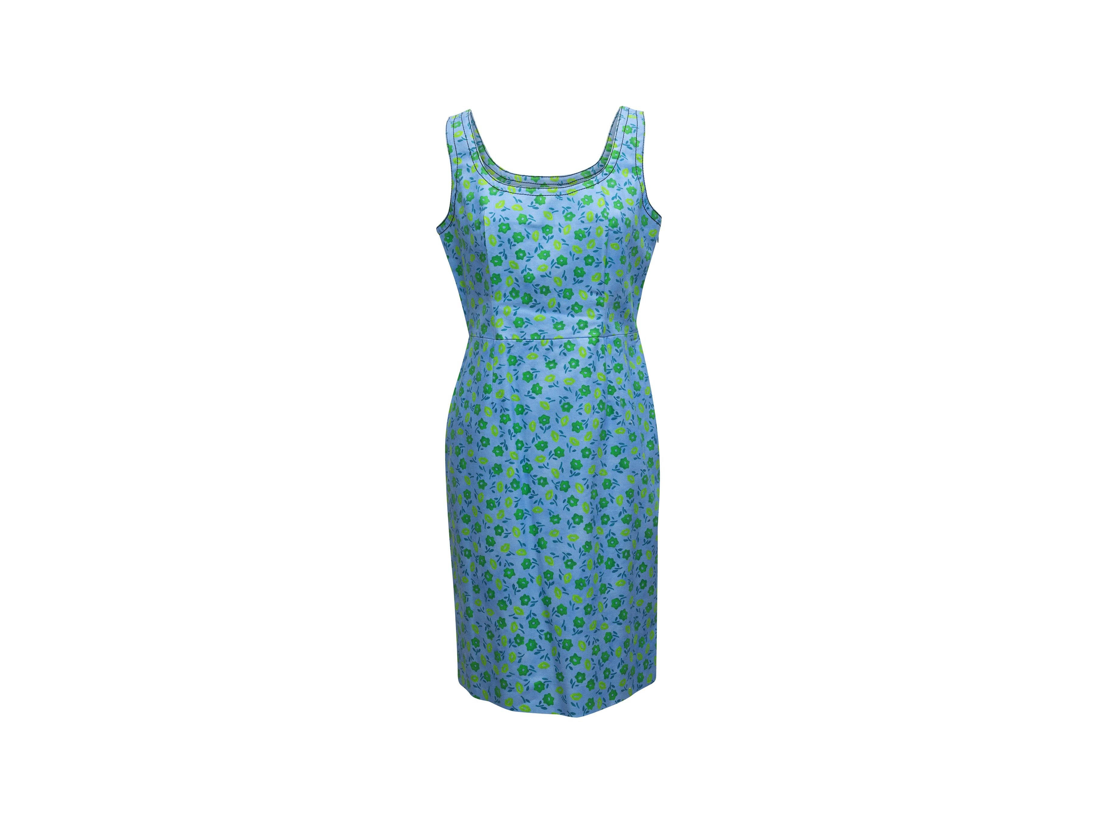 Product details: Light blue and green floral print sleeveless dress by Prada. Scoop neckline. Zip closure at side. Designer size 46. 33