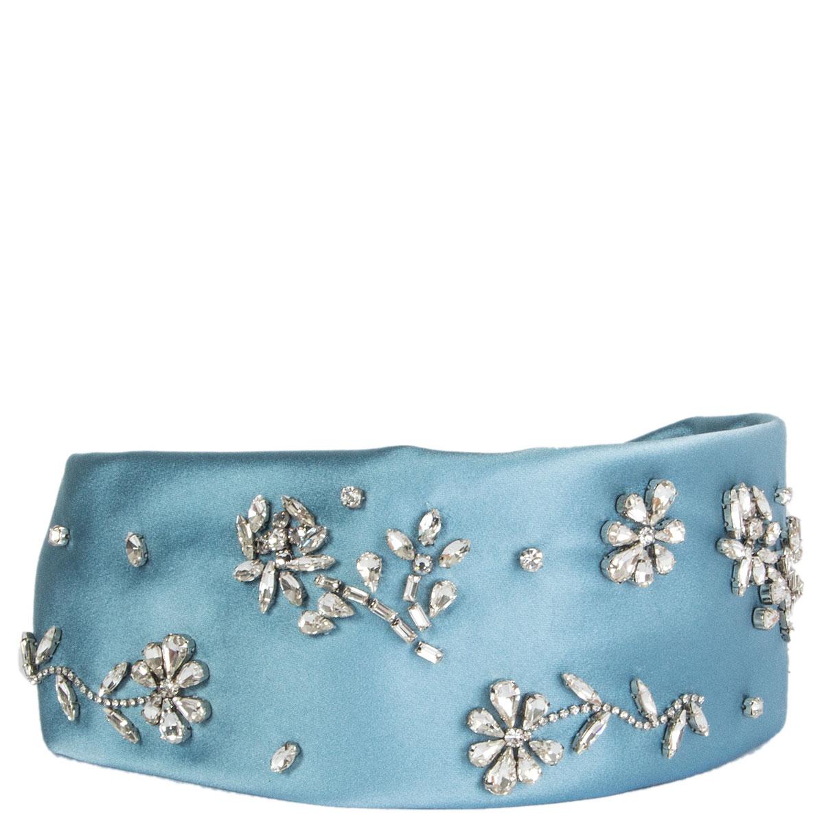 100% authentic Prada crystal embellished headband in light blue silk satin (100%) featuring a curved structure and a stretch fit. Brand new. Comes with dust bag. 

All our listings include only the listed item unless otherwise specified in the