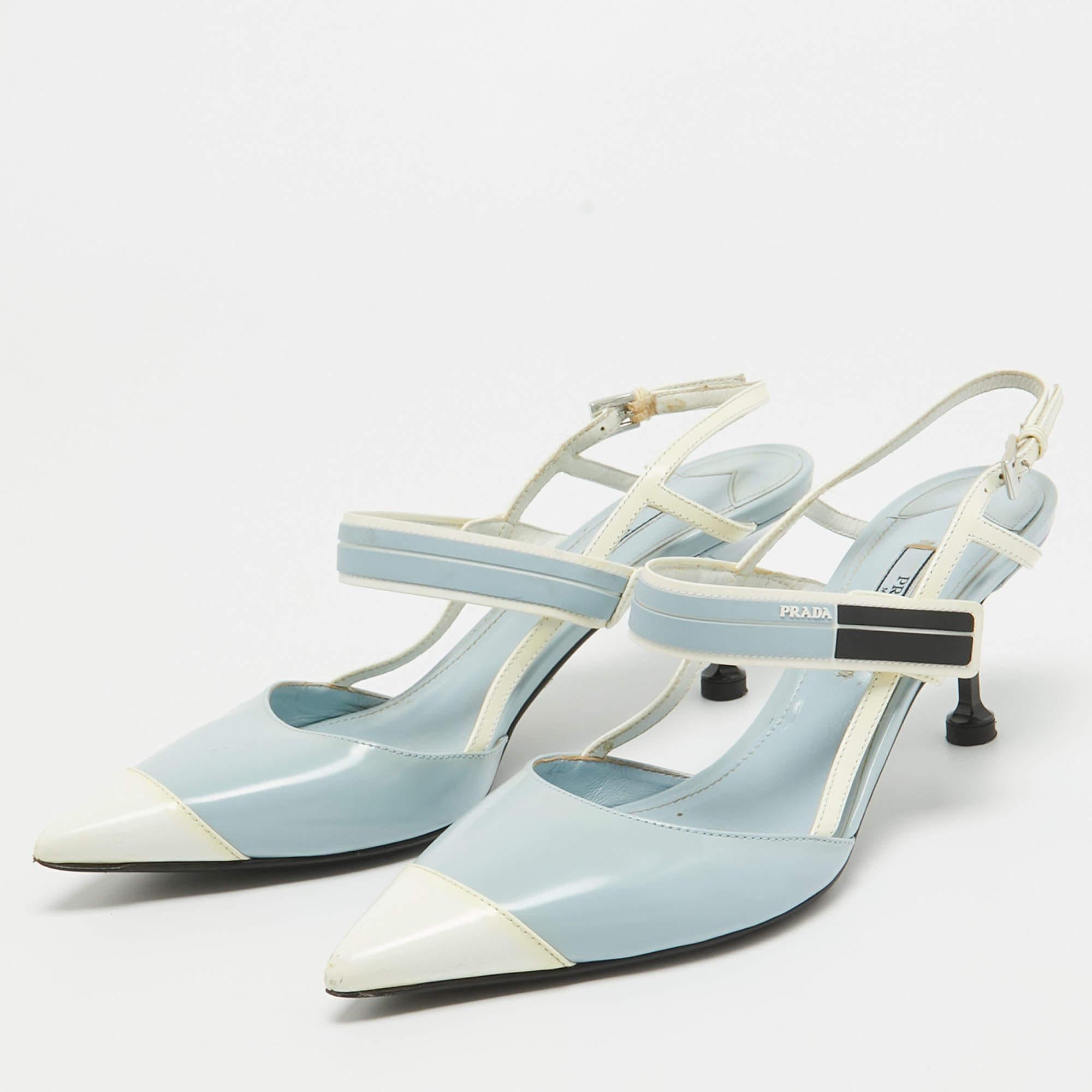 Create the most sophisticated looks with these Prada slingback pumps. Designed from leather and rubber with logo detailed straps they are adorned with pointed toes and low heels that will lift you with poise and confidence.
