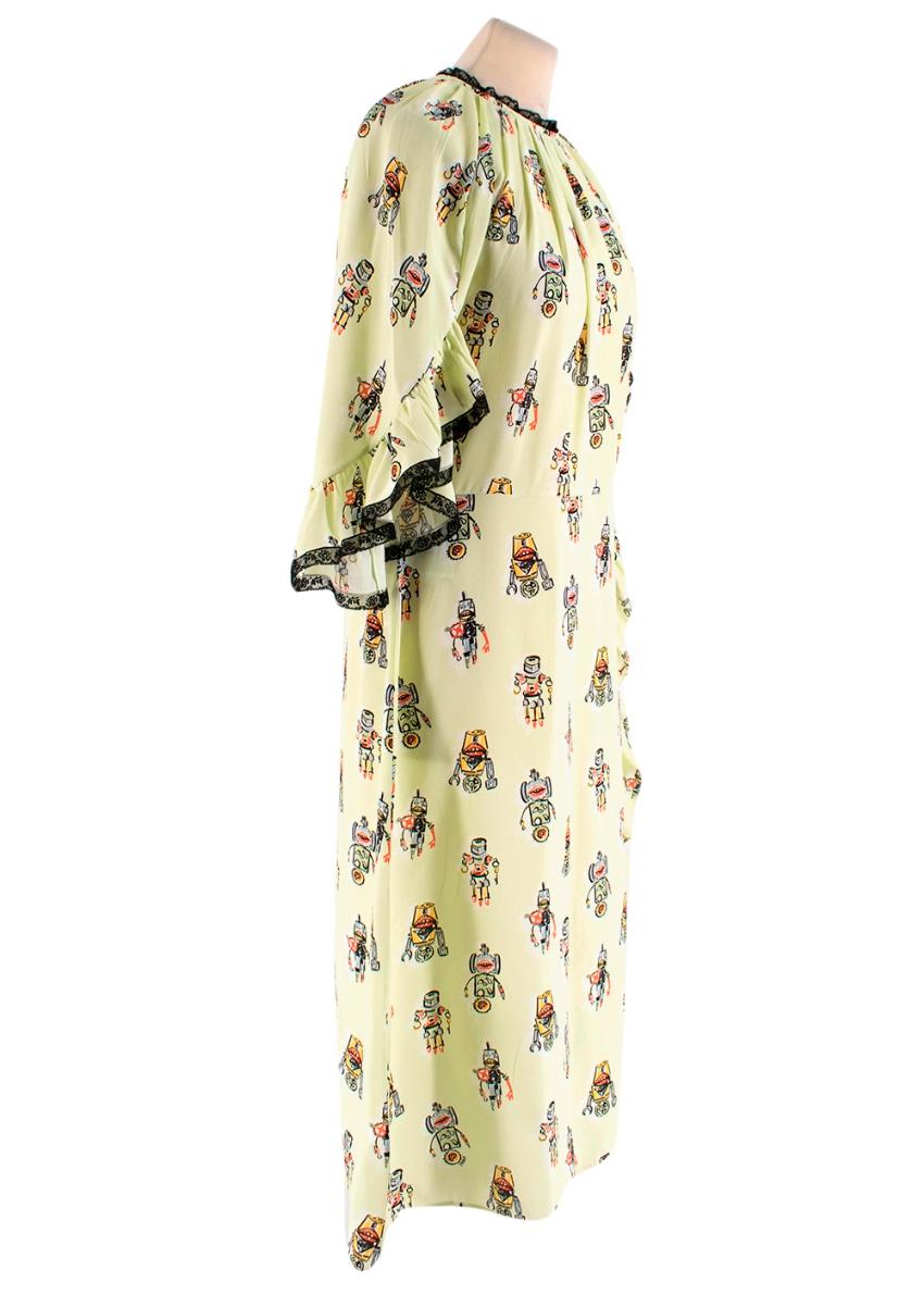 Prada Lime Green Robot Print Ruffle Trim Dress   RRP £1195

- flared sleeve with black lace trim - lace neckline - round neck - pleated top - zip fastening at the back - string necktie - lightweight 

Please note, these items are pre-owned and may