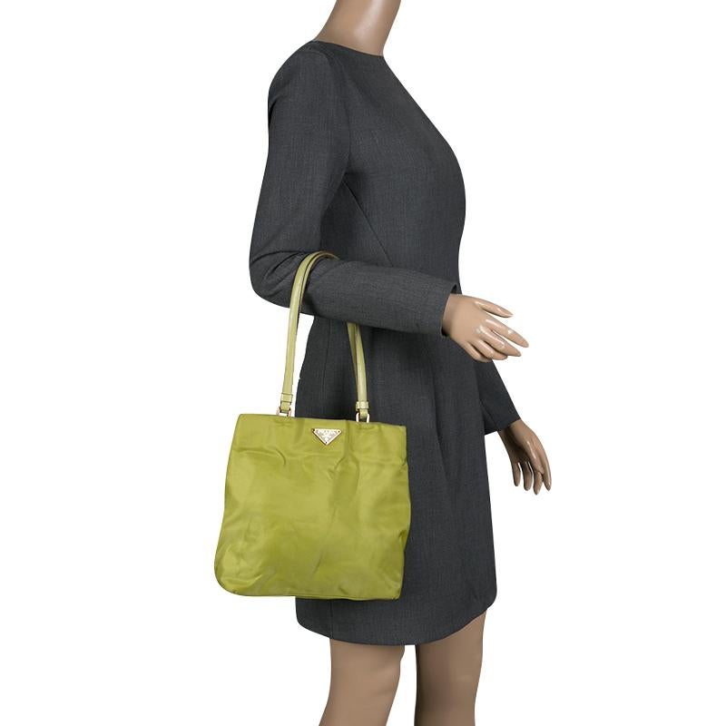 The rich green color is extremely dreamy and will complement your dresses perfectly. Designed to perfection, the interior of this bag is lined with nylon. You mark a great impression when you look great! Carry this stylish nylon handbag from Prada