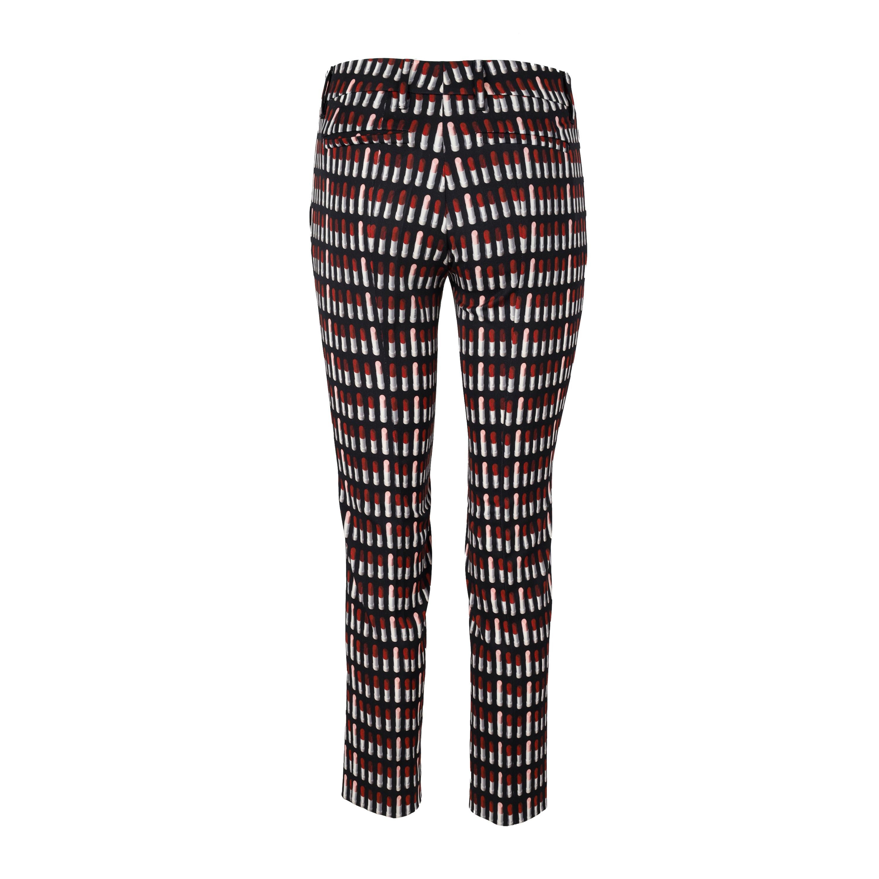 These Prada Lipstick Printed Pants are the perfect blend of fashion and comfort. Crafted from quality fabrics and designed with a flattering fit, they make a chic addition to any wardrobe. A unique lipstick print add a touch of bold style, while the