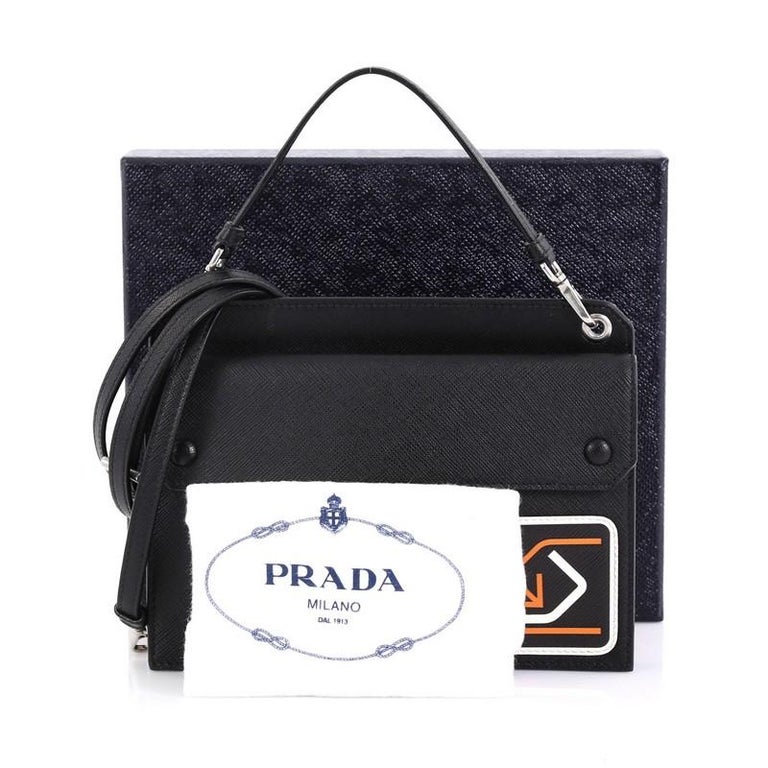 leather logo-patch shoulder bag, Prada