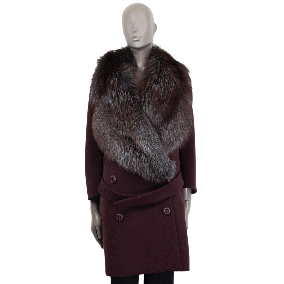 Prada belted oversize fur-collar runway coat in maroon wool (100%- tag has been removed) with a a brown and turquoise fur collar, 3/4 sleeves and slit pockets. Closes on the front with snap buttons. Lined in viscose (assumed as tag is missing). Has