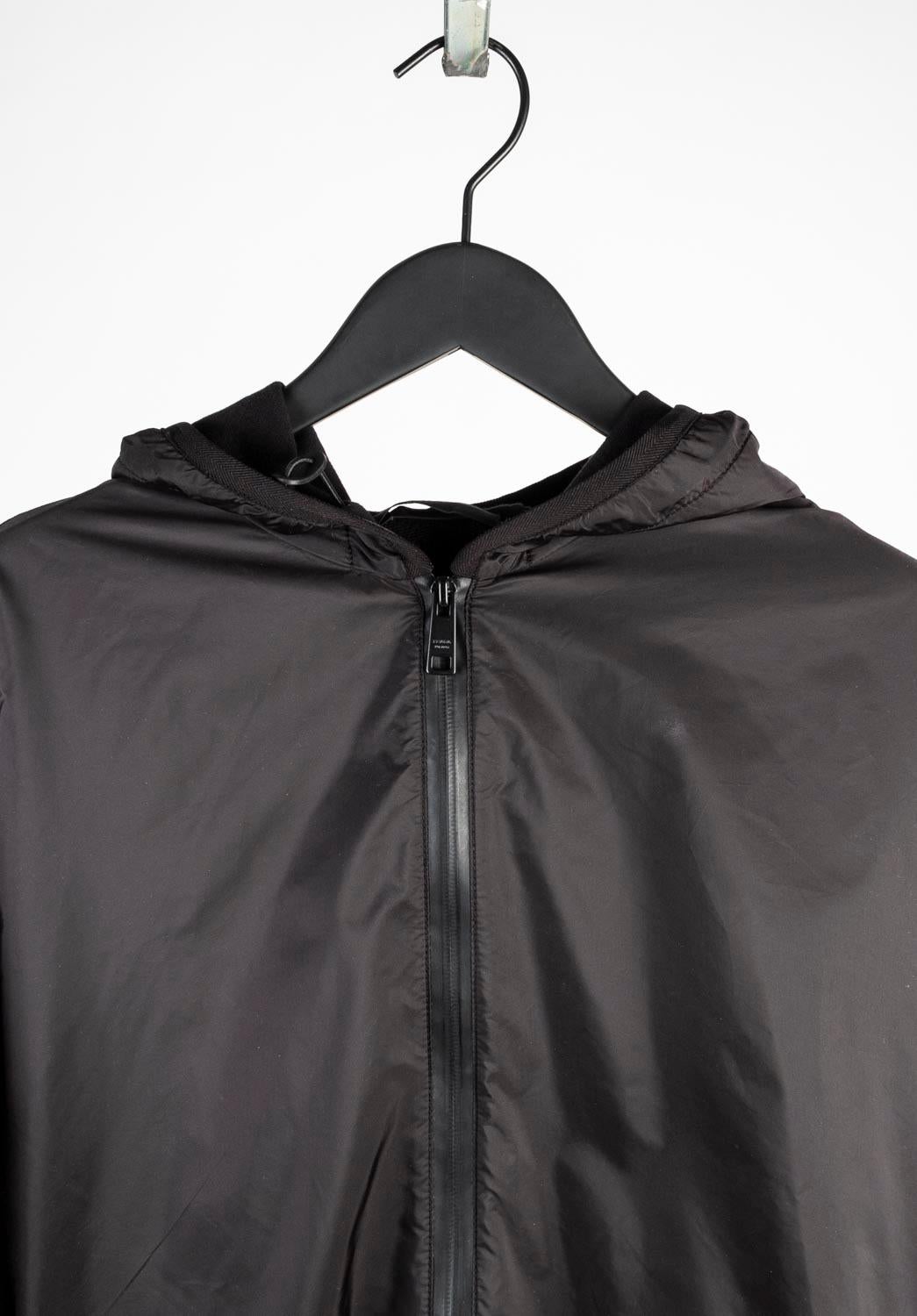 100% genuine Prada Hooded Men Jacket, S705
Color: black
(An actual color may a bit vary due to individual computer screen interpretation)
Material: cotton, front polyamide
Tag size: XXL runs L/XL (little smaller as for all Prada)
This jacket is