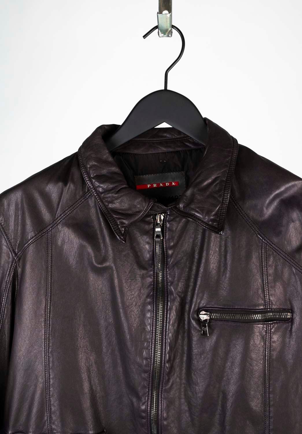 100% genuine Prada Leather Men Jacket, S562
Color: Brown
(An actual color may a bit vary due to individual computer screen interpretation)
Material: Leather
Tag size: Large
This jacket is great quality item. Rate 9 of 10, excellent condition.
Actual