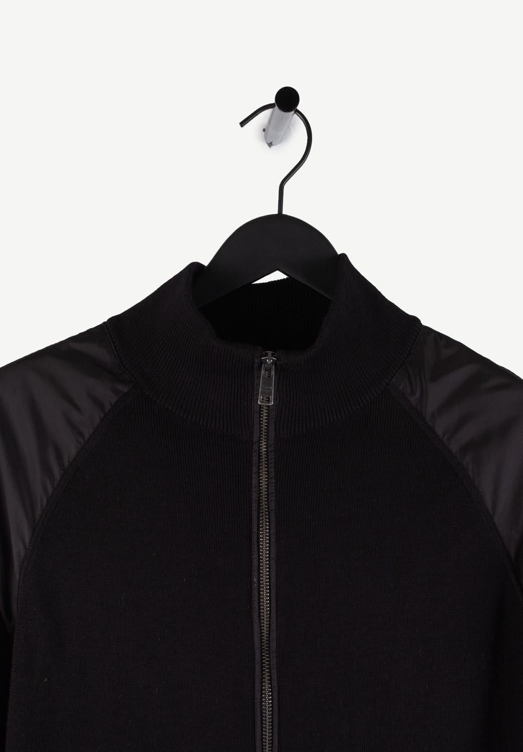 Item for sale is 100% genuine Prada Wool Zipped Sweater/Jacket, S303
Color: Black
(An actual color may a bit vary due to individual computer screen interpretation)
Material: 100% wool/100% polyamide
Tag size: 50IT (runs Medium)
This jacket is great