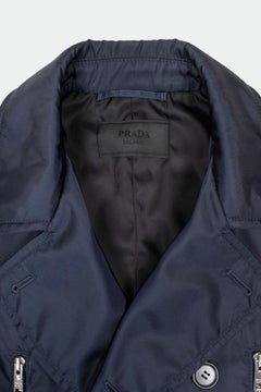 Giacca da uomo Prada leggera in poliammide blu con cerniere, taglia IT48