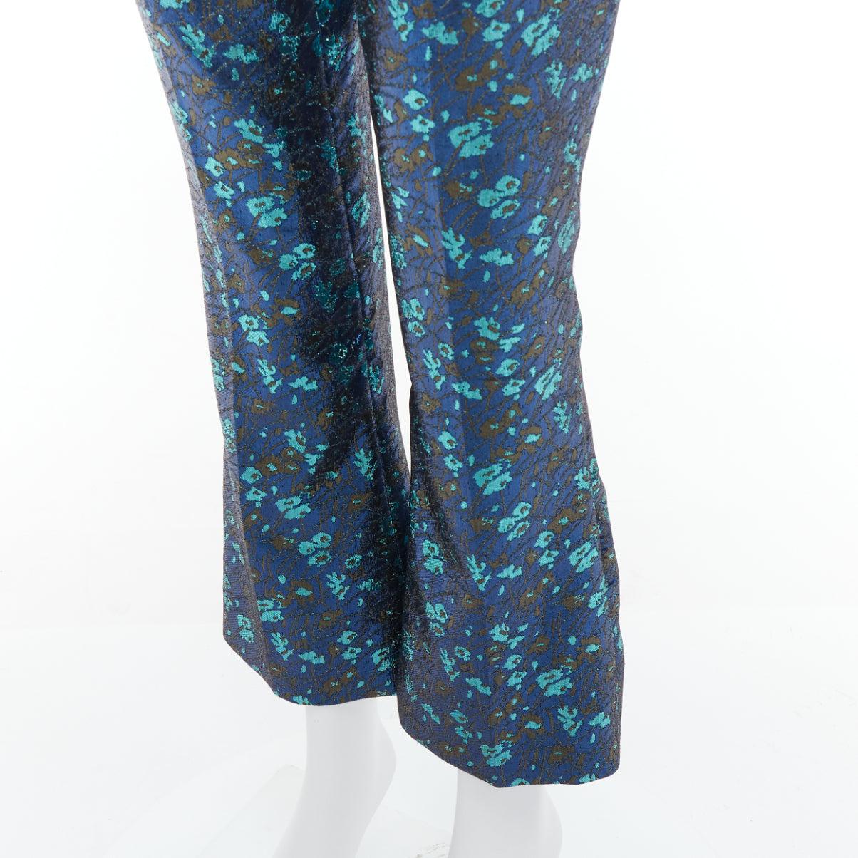 PRADA metallic blue green floral lurex brocade crop pants trousers IT38 XS
Reference: MECG/A00111
Brand: Prada
Designer: Miuccia Prada
Material: Polyester
Color: Blue, Green
Pattern: Brocade
Closure: Zip
Extra Details: Side zip.
Made in:
