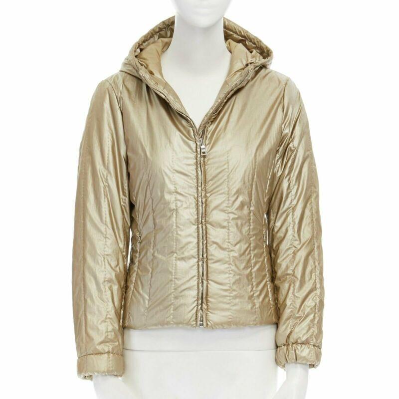 PRADA metallic gold nylon polyester padded hooded fitted winter jacket IT38 XS
Reference: CC/AYWG00206
Brand: Prada
Designer: Miuccia Prada
Material: Nylon
Color: Gold
Pattern: Solid
Closure: Zip
Extra Details: 100% nylon outer shell. 100% polyester