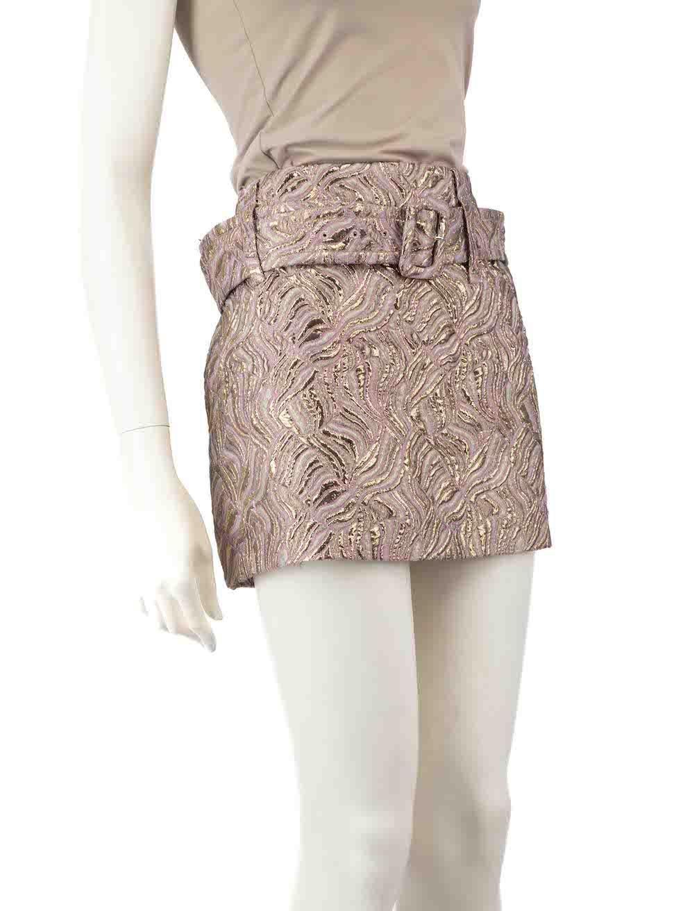 CONDITION is Very good. Minimal wear to skirt is evident. Minimal wear to the belt with minimal tarnishing, the right side with pulls to the weave and a small discolouration mark on the waistband on this used Prada designer resale item.
 
 
 
