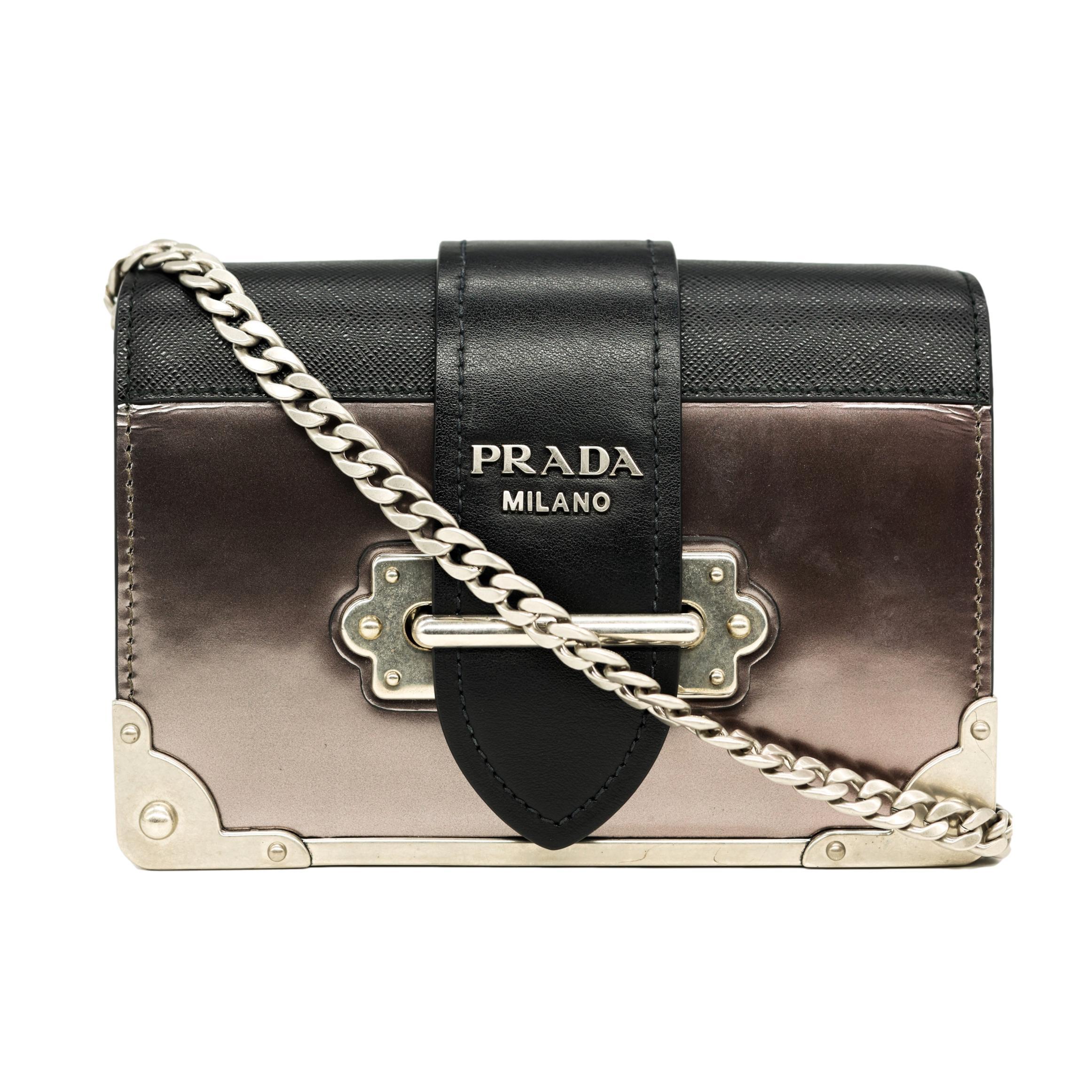 Prada Metallic Purple Cahier Saffiano Leather and City Calf Crossbody Bag, 2018. Introduced in the fall of 2016, the 