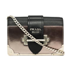 Prada Metallic Purple Cahier Saffiano Leather and City Calf Crossbody Bag, 2018.