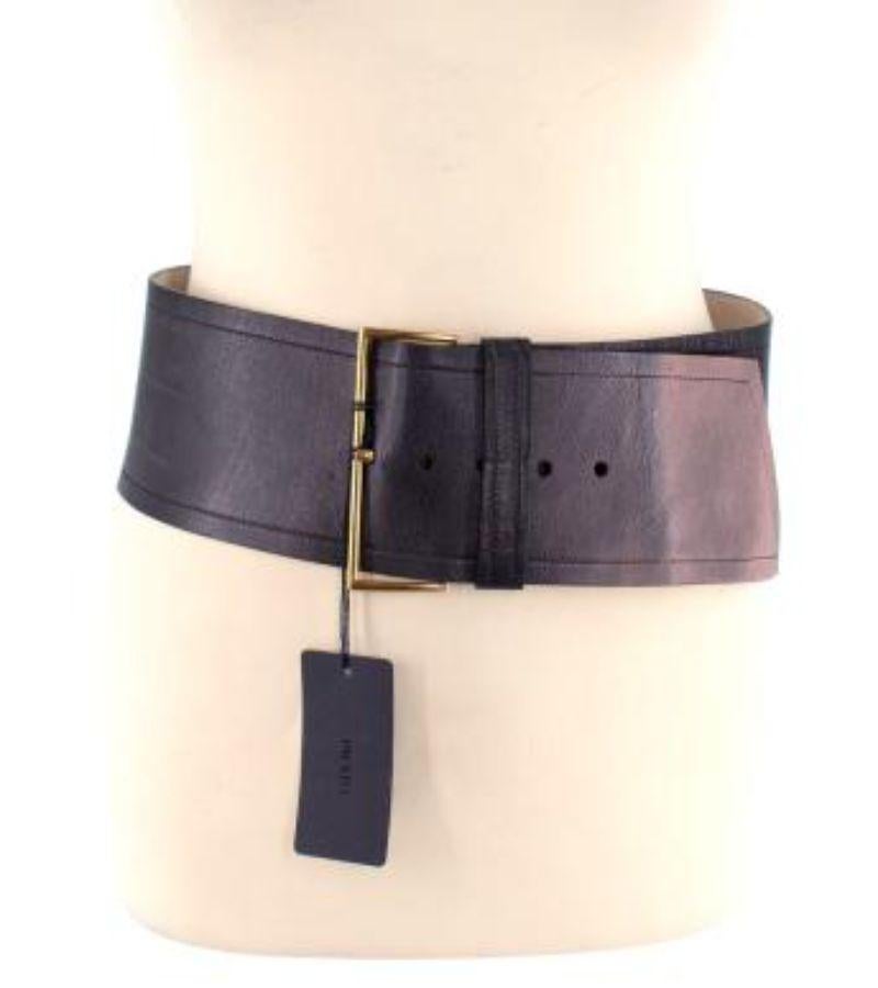 Prada metallic purple ombre wide waist belt - size 85

-Gold tone hardware 
-Suede interior 
-Oversized buckle fastening 
-Adjustable 

Material: 

Suede 
Brass 
Leather 

Made in Italy 

PLEASE NOTE, THESE ITEMS ARE PRE-OWNED AND MAY SHOW SIGNS OF