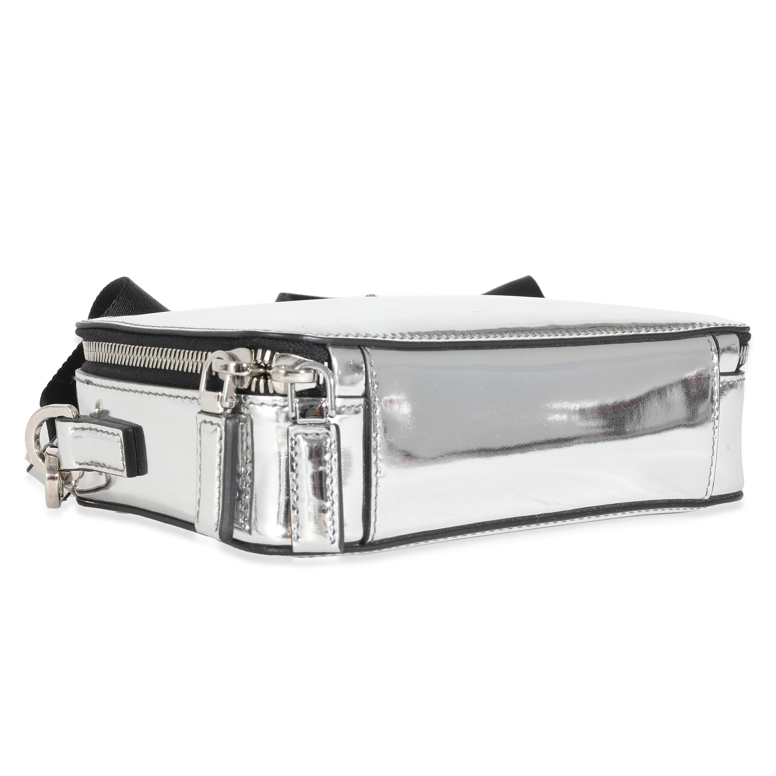 Listing Title: Prada Metallic Silver Spazzolato Brique Crossbody
SKU: 135968
Condition: Pre-owned 
Handbag Condition: Excellent
Condition Comments: Item is in excellent condition and displays light signs of wear. Minor scratches along