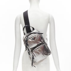 PRADA metallic silver triangle logo small sling backpack bag