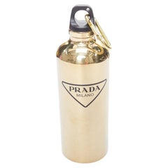 PRADA mirrored gold stainless steel black logo water bottle
