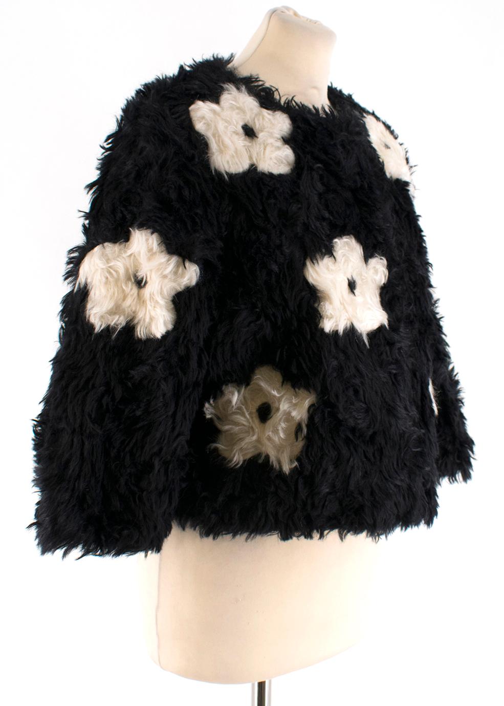 Prada Daisy Print Faux Fur Jacket in Black 

- Round Neckline 
- Straight Hemline 

- 31% Cotton
- 69% Mohair

- Made in Italy 

Shoulders: 14cm
Sleeves: 43cm
Length: 45cm