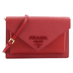 Prada Monocromo Sobre Bolsa Crossbody Saffiano con City Calf Mini