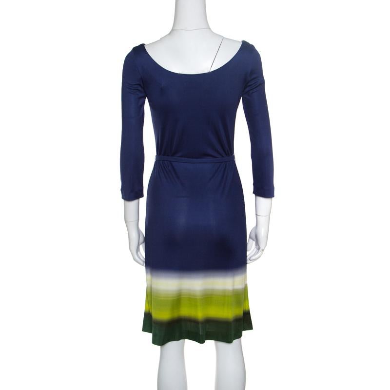 Now dress to impress with this fabulous creation from Prada. This multicolour dress is made of 100% silk and features a flattering silhouette. It flaunts a boat neckline, long sleeves and a belt at the waist. Pair it with pointed pumps and a sling