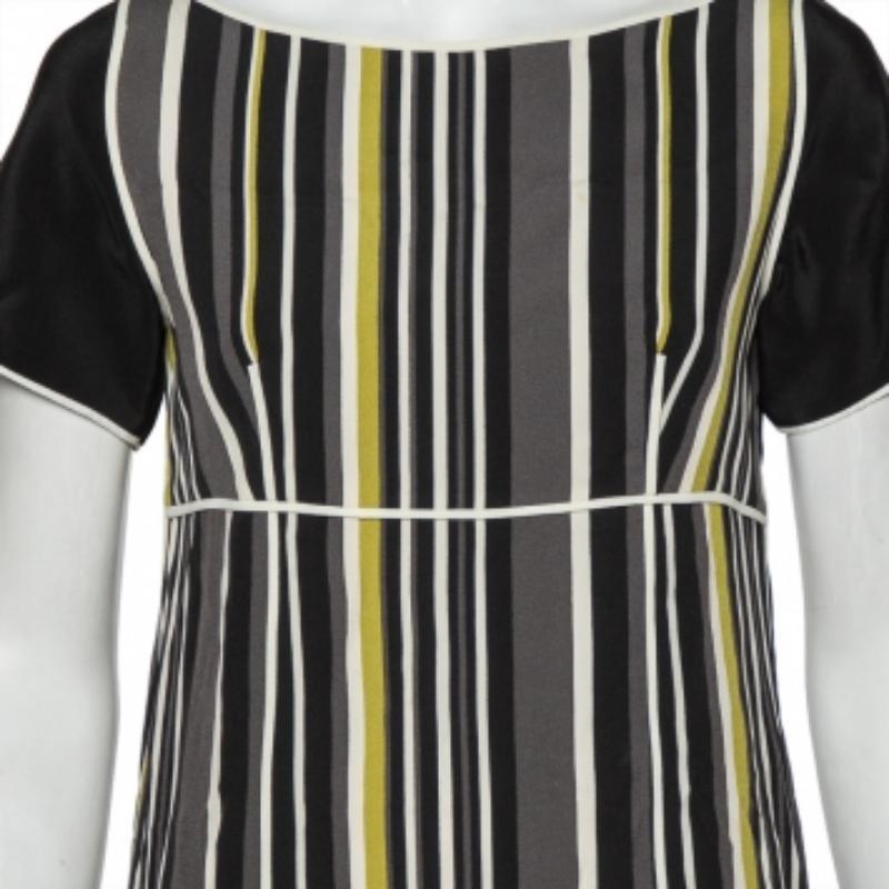 An elegant and urbane piece like this Prada dress deserves a special place in your wardrobe. A smart number like this midi dress requires minimal effort to look like a million bucks. Womanly and stylish, this comfortable piece features a striped