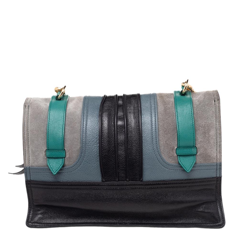 Stylish and edgy, this Etiquette shoulder bag comes from the house of Prada. It has been crafted in Italy and made from suede & leather. This multicolored bag has gold-tone hardware, a front flap with the logo that opens to a spacious suede-lined