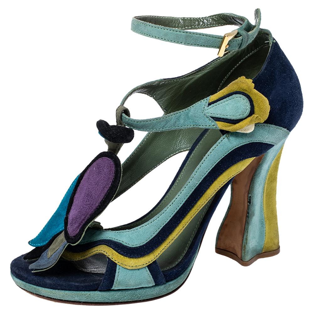 For its Spring 2008 collection, Prada collaborated with comic artist James Jean and released designs that were nothing short of magical. From that very line comes this pair of pumps that are crafted from suede. They flaunt an artistic design
