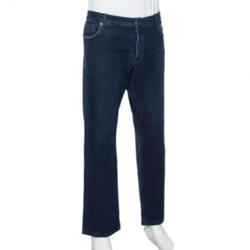 Jeans are wardrobe staples and the epitome of casual style. These Prada jeans are perfectly tailored to deliver a straight fit that is flattering. Crafted from denim, they come in a lovely shade of navy blue. They are styled with five pockets and
