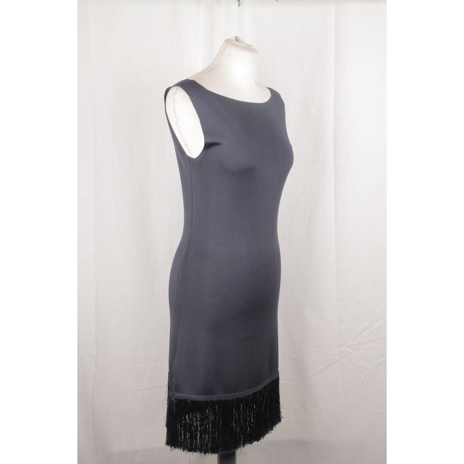MATERIAL: Rayon COLOR: Blue MODEL: Sleeveless Dress GENDER: Women SIZE: Small CONDITION RATING: A :EXCELLENT CONDITION - Used once or twice. Looks mint. Imperceptible signs of wear CONDITION DETAILS: gently used MEASUREMENTS: SHOULDER TO SHOULDER: