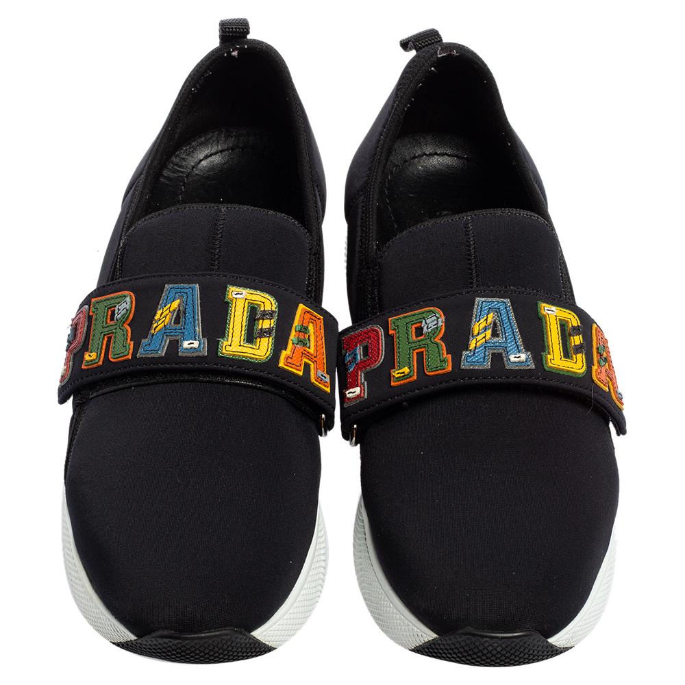 Look your stylish best every time you step out wearing these trendy Prada sneakers. Crafted from quality materials into a round toe silhouette, these laceless kicks are adorned with vamp straps elevated by the label's name on them.


