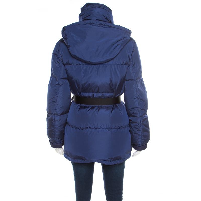 Stay warm in this ultra-stylish puffer down jacket by Prada. Designed in a fabulous silhouette, the jacket, crafted from quality fabrics, will look cool with your winter separates. It features front zip fastening, two external pockets, an