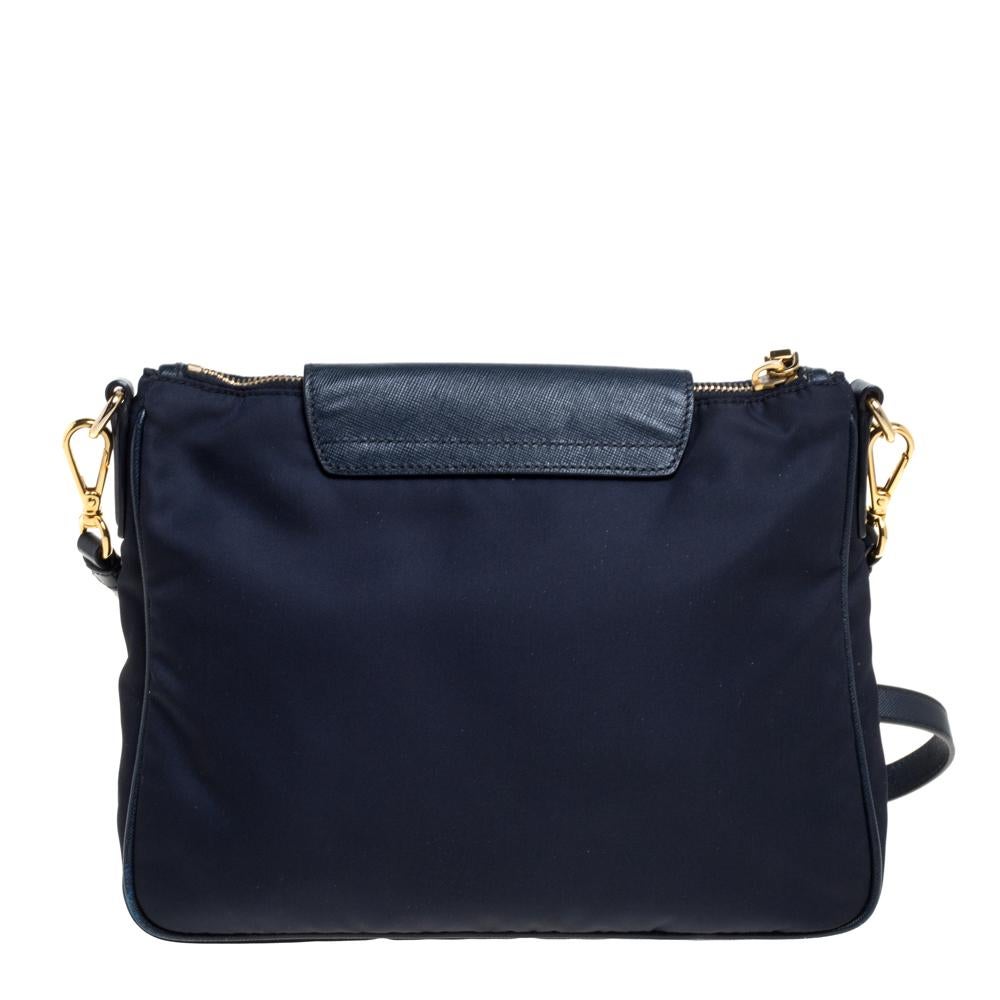 From the house of Prada comes this gorgeous crossbody bag. It flaunts the brand logo on the front flap and has been crafted from nylon and leather. The zip closure opens to reveal a well-sized nylon interior and the bag is complete with an