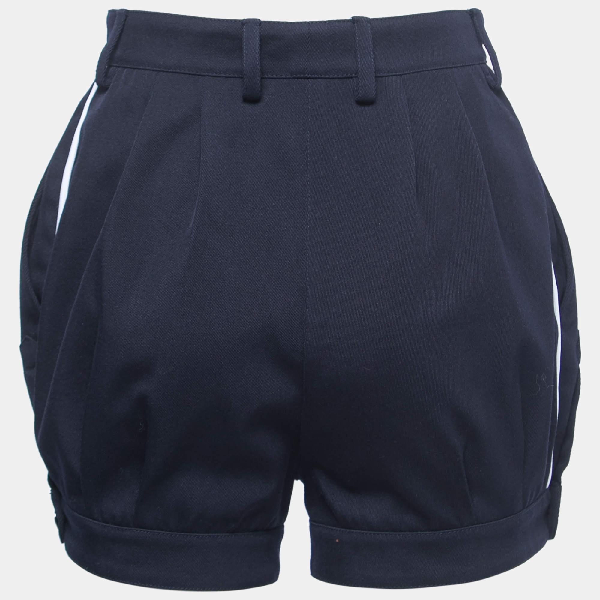 Crafted from high-quality wool, they offer a comfortable and luxurious feel. With a rich navy blue color, these shorts exude sophistication and can be dressed up or down for various occasions.

