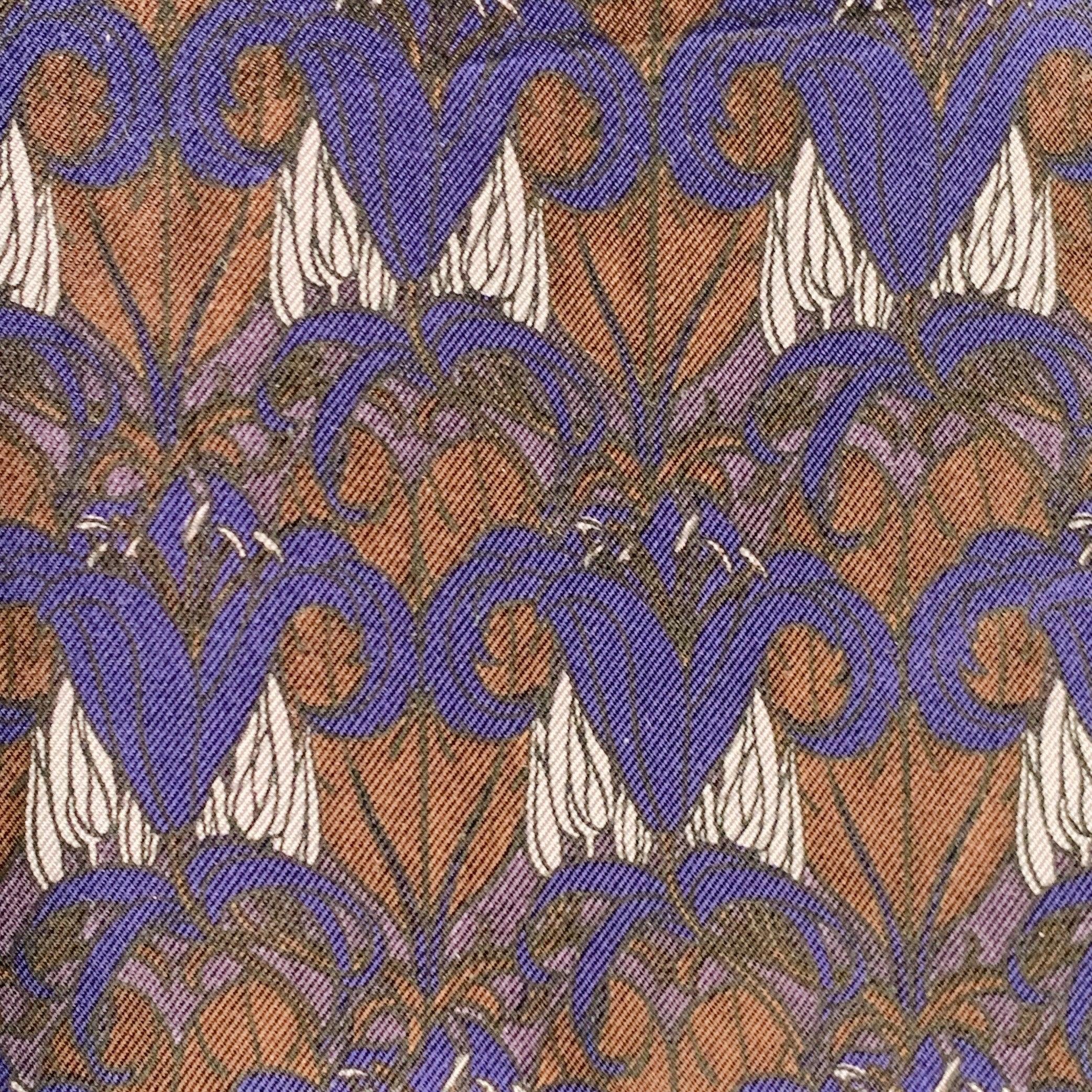 PRADA pocket square in a navy and brown fabric featuring an abstract floral pattern.Very Good Pre-Owned Condition. Brand tag removed by previous owner. 

Measurements: 
  11.25 inches  x 11 inches 

  
  
 
Sui Generis Reference: 136440
Category: