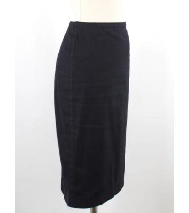 Prada Navy Pencil Skirt

-Navy midi pencil skirt 
-Slit at the back
-Side zip with hook and eye closure
-Zip pull embossed with Prada

Please note, these items are pre-owned and may show signs of being stored even when unworn and unused. This is