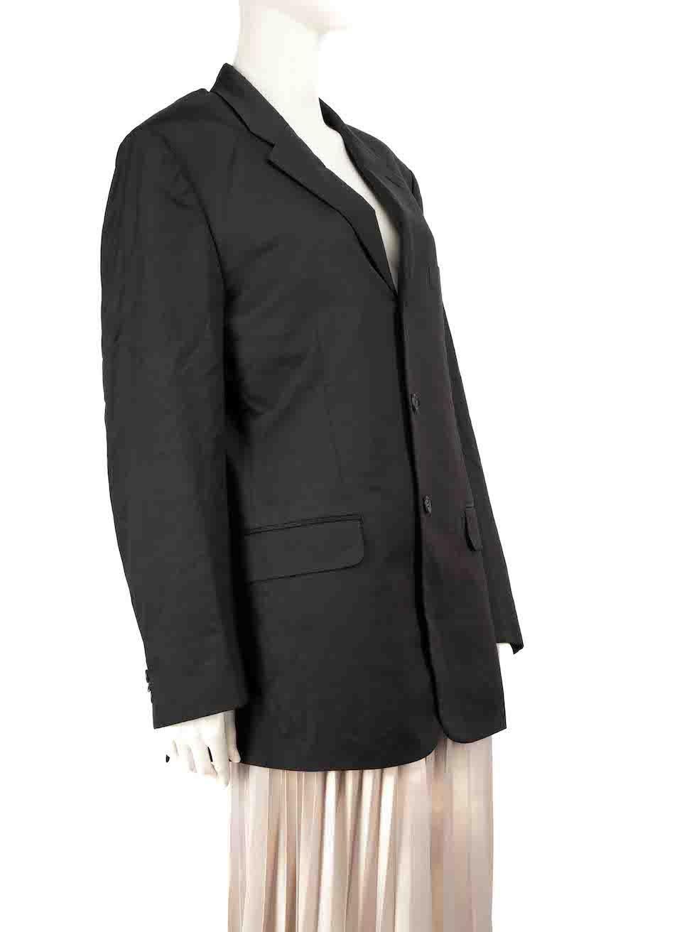 CONDITION is Good. Minor wear to the blazer is evident. Light discolouration to the interior of both cuffs, internal pocket and the bottom rear hemline. Small pull to weave on the left cuff and pull to thread on the bottom right sleeve on this used