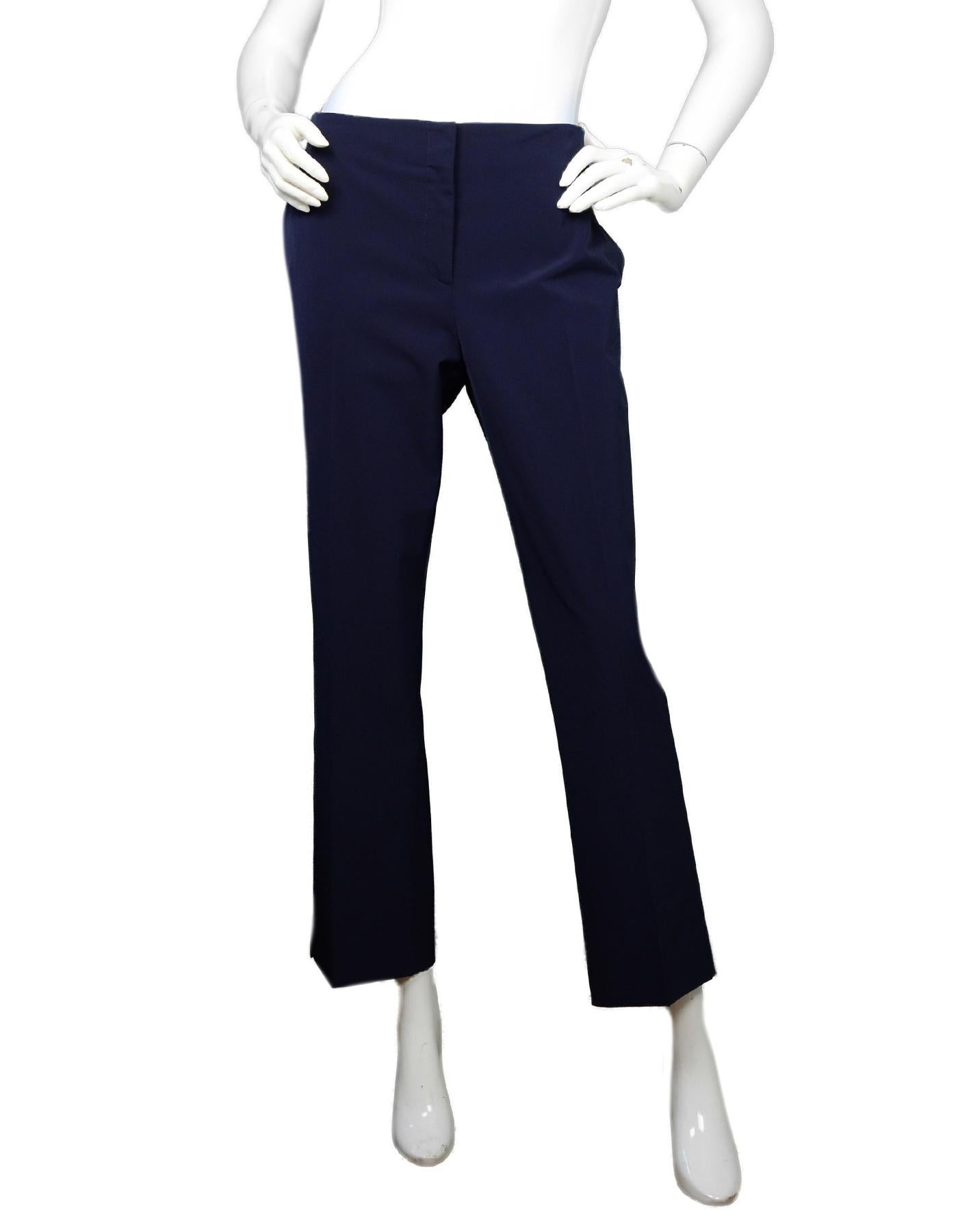 Prada Navy Techno Stretch Ankle Pants Sz IT48/US12

Made In: Italy
Color: Navy
Materials: 89% polyester, 11% elastane, pocket lining- 100% cupro 
Closure/Opening: Zipper and button front
Overall Condition: Excellent pre-owned condition 
Estimated