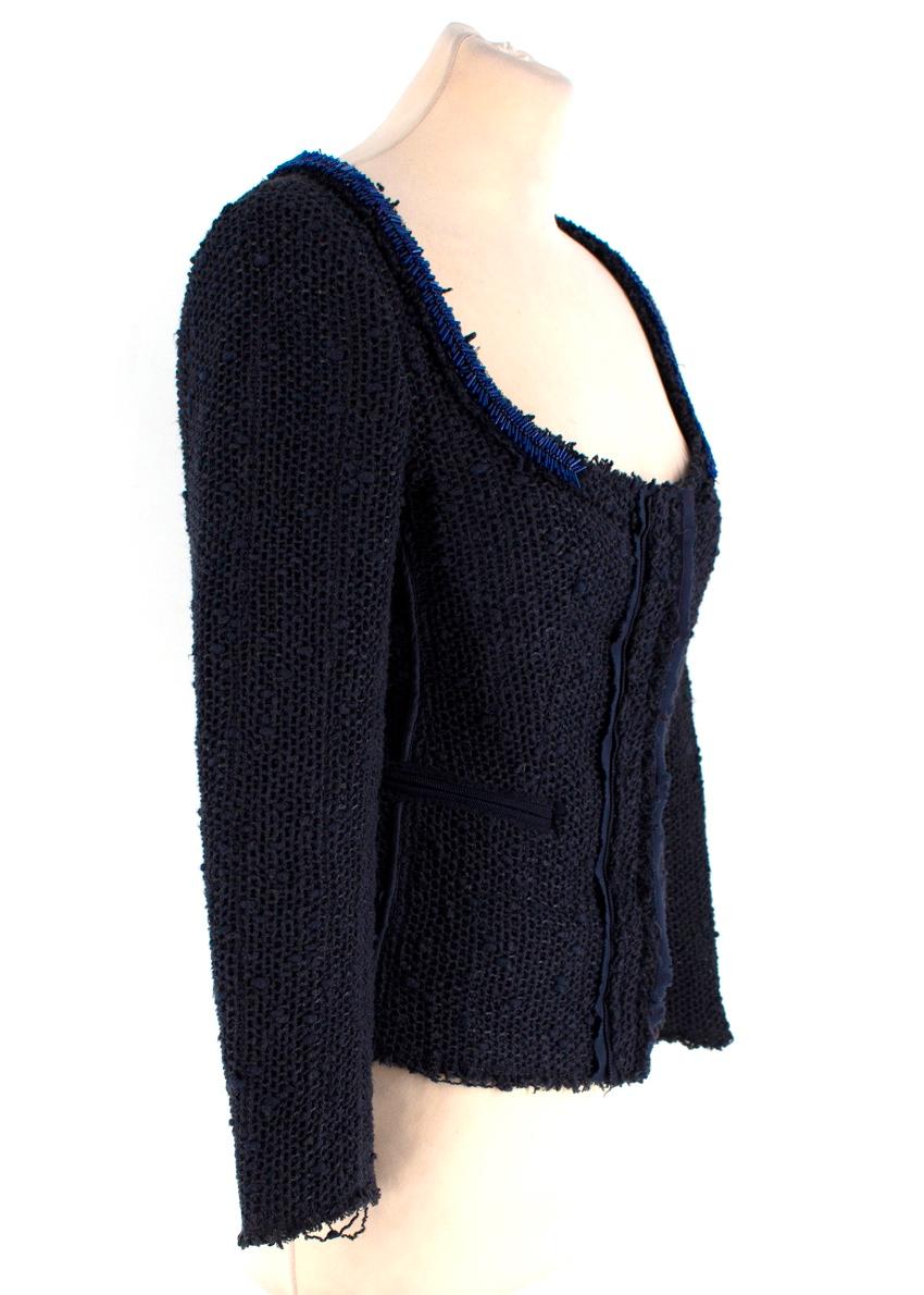 Prada Navy Wool-blend Beaded Lightweight Jacket

- Navy blended fibres knit creating a mixed textured finish
- Short length
- Very lightweight
- Unfinished hem and cuffs
- Front diagonal welt pockets
- Fitted silhouette
- Low scoop neckline
-