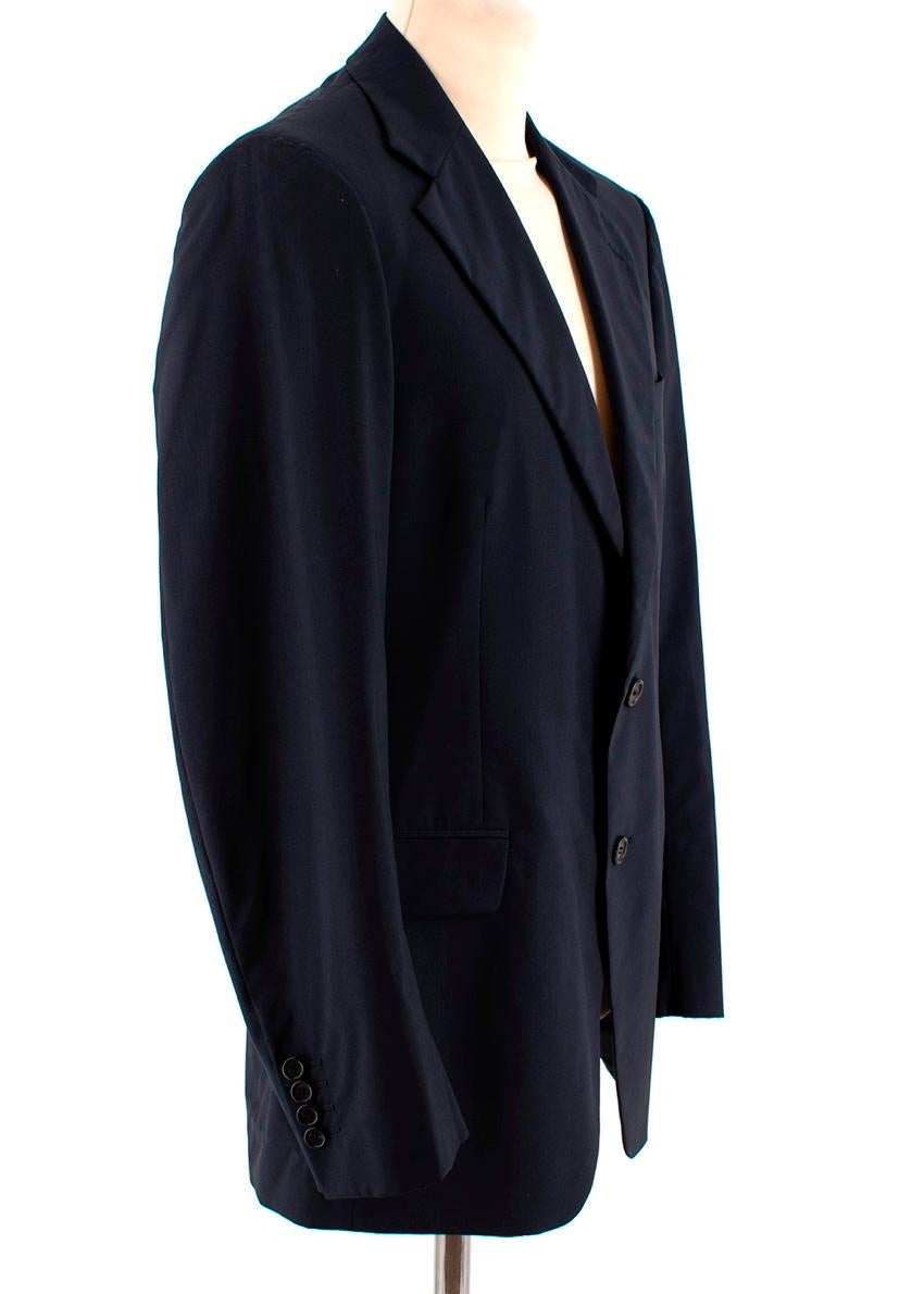 Prada Navy Wool Single Breasted Blazer Jacket

-Made of soft lightweight wool 
-Gorgeous navy hue 
-Vent to the back 
-3 pockets to the front
-3 inner pockets
-Fully lined 
- Button fastening to the front 
-BUttoned cuffs 

Materials:
100% virgin